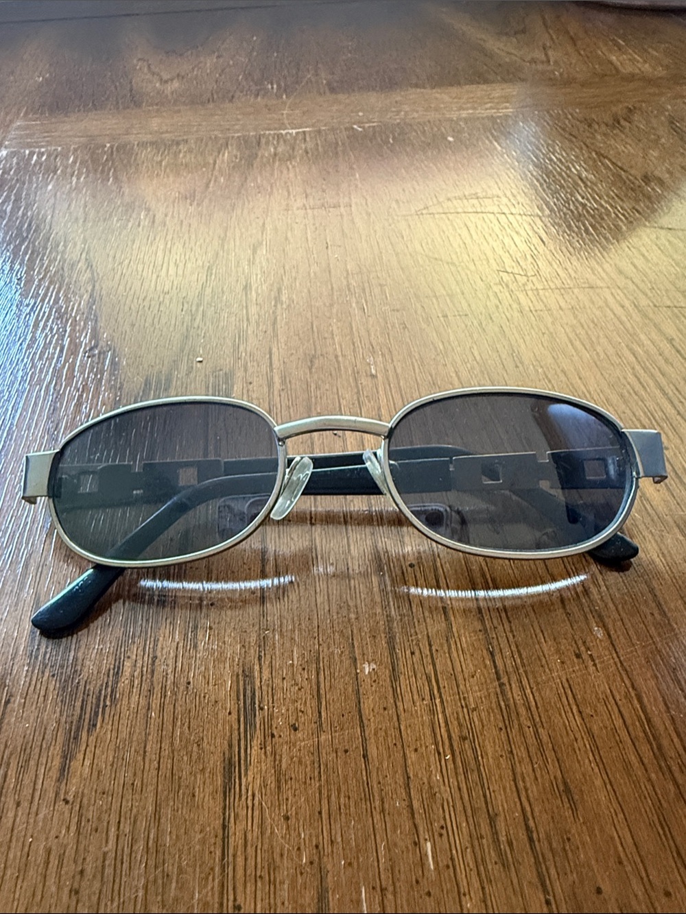Gucci Oval Metal Frame Sunglasses in Silver with Black Lenses